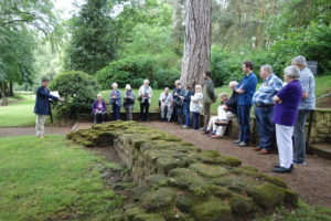 Summer Symposium 2018: David Roberts showing ASPROM members round Aldborough Roman Town